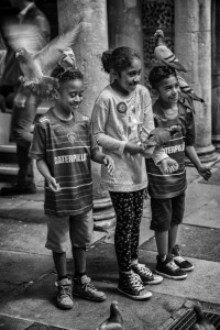 kids and pigeons- street photography from Bath