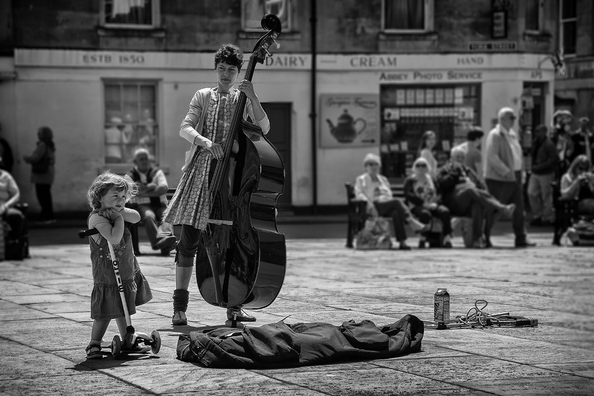 the cello player & scooter girl