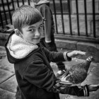 smiling boy with birds