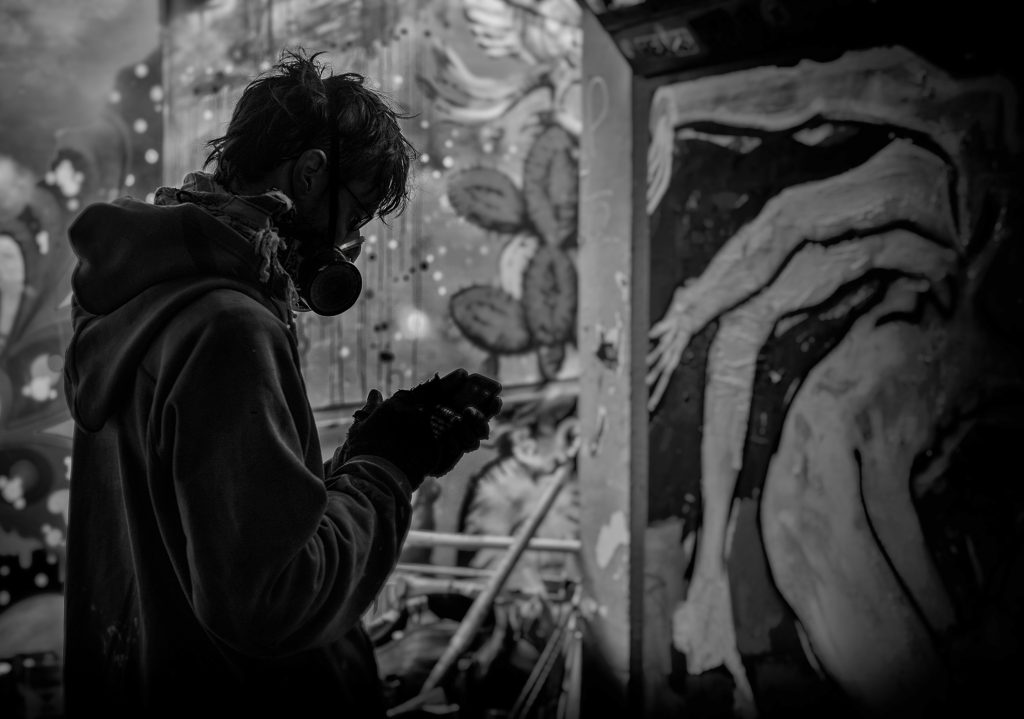 Masked graffiti artist -bristol street photography